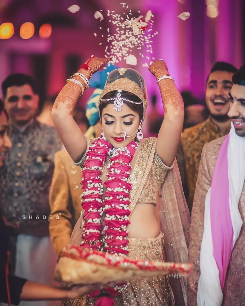 The Reason Behind An Indian Bride Throwing Rice During Her 'Vidaai' Is