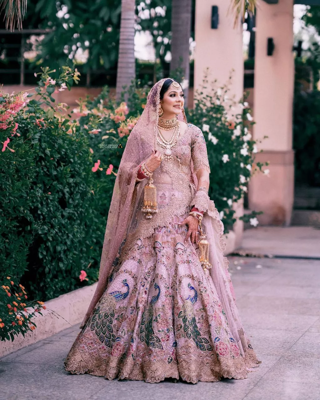 Bride Donned A Rouge Pink Tulle-Silk Lehenga, Paired It With ...