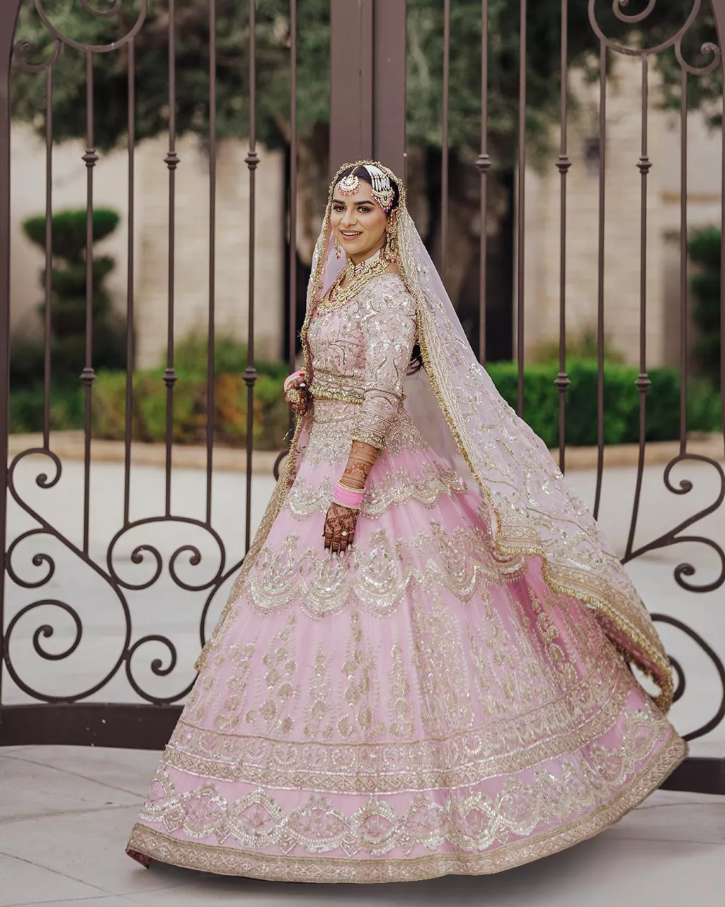 Manish Malhotra Bride Exudes Charm In A Gold Adorned Baby Pink Lehenga ...