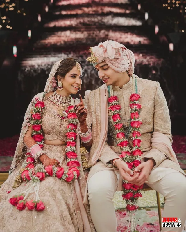 Bride Wore A Gorgeous Ivory Lehenga With A Unique Blouse And Pink 'Chooda'