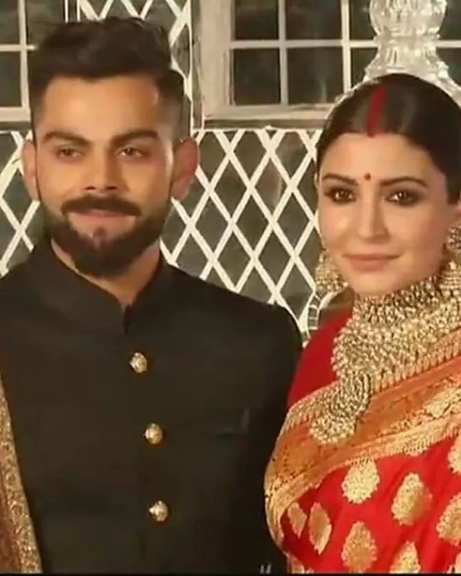 LIVE: First Look Of Virat And Anushka From Their Wedding 