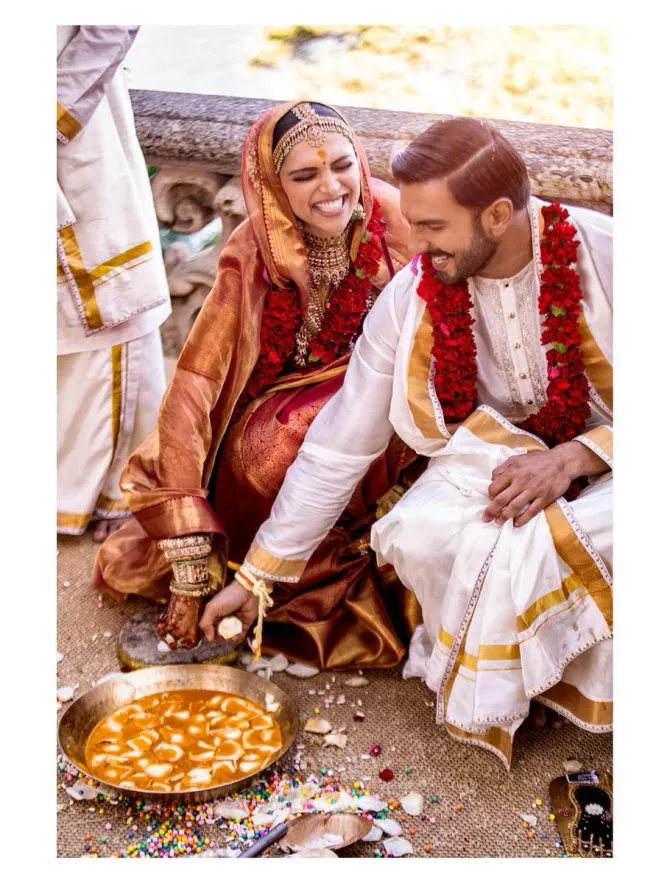 Deepika Padukone & Ranveer Singh Wedding Reception Wear Heavy Saree &  Sherwani Combo at Rs 18,395 / Piece in Ahmedabad