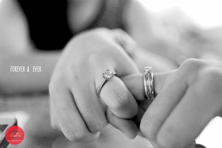engagement ring with pure shiny diamond on black cloth Stock Photo - Alamy