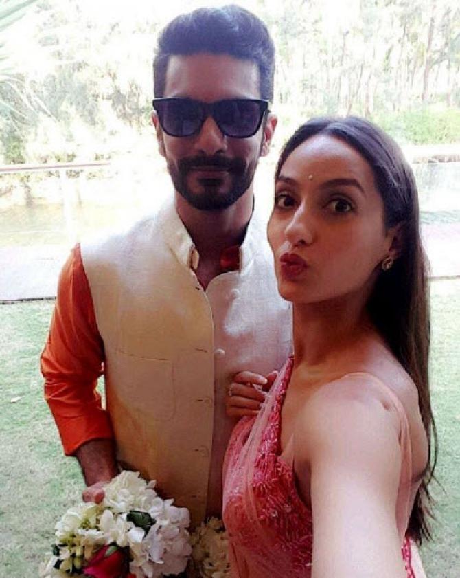 Angad Bedi's Ex-GF Nora Fatehi Reacts Unexpectedly On His Marriage With