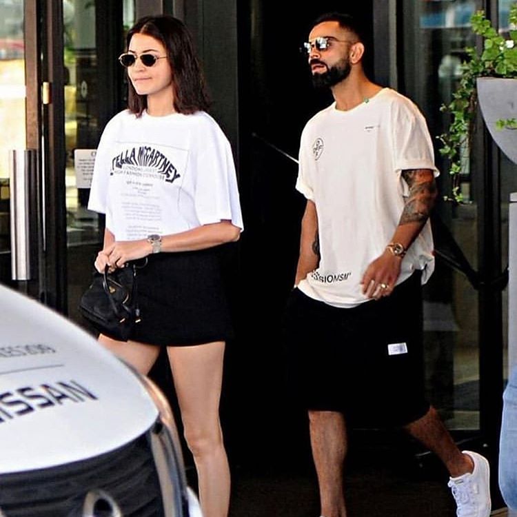 Anushka Sharma and Virat Kohli twin in black and white outfits