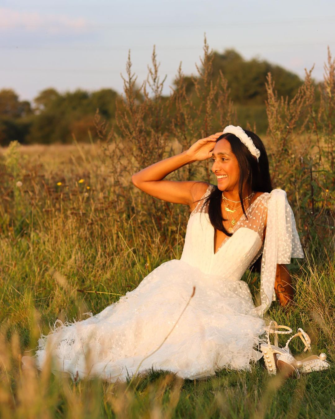 This bride switched between a pink lehenga and a white dress for her  magical Anglo-Indian wedding