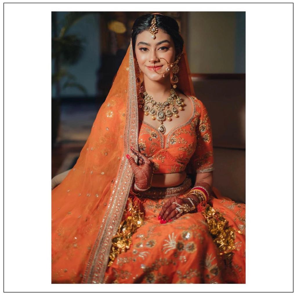 Bridal Solo Pose with Orange Sari