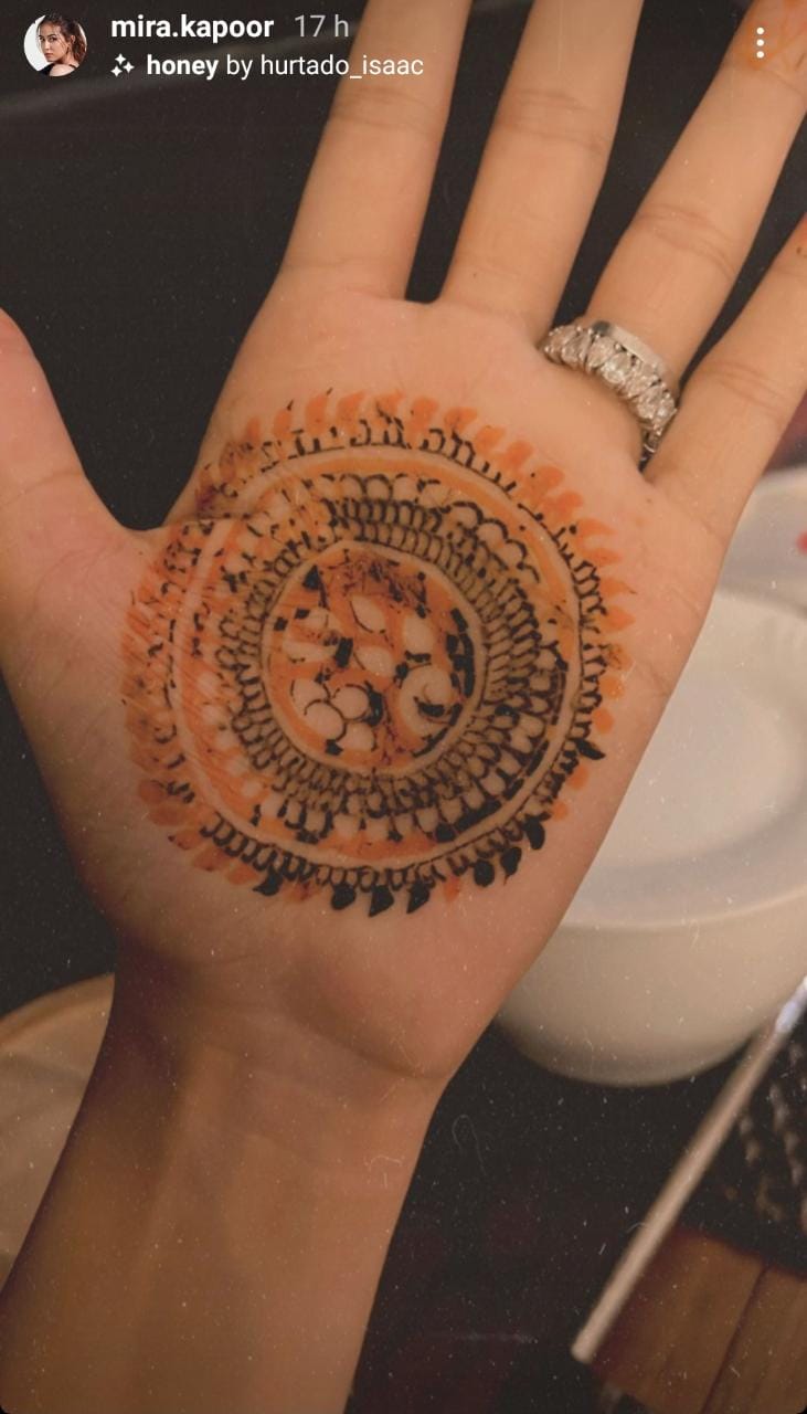 Close-Up Shot of a Person with Mehndi Tattoo · Free Stock Photo