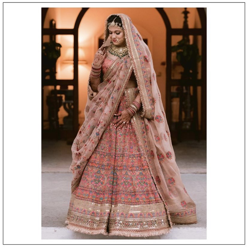 Photo of Peach sabyasachi stunning jacket style leheng