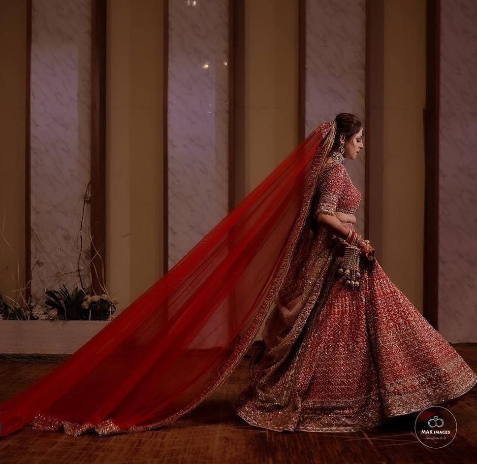 Sabyasachi Bride Stuns In A Crimson-Coloured Lehenga, Dons 'Polki' Jewellery