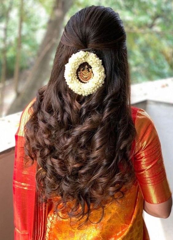 Fashion world: South Indian bride's bridal reception hairstyle styled by  Swank Studio