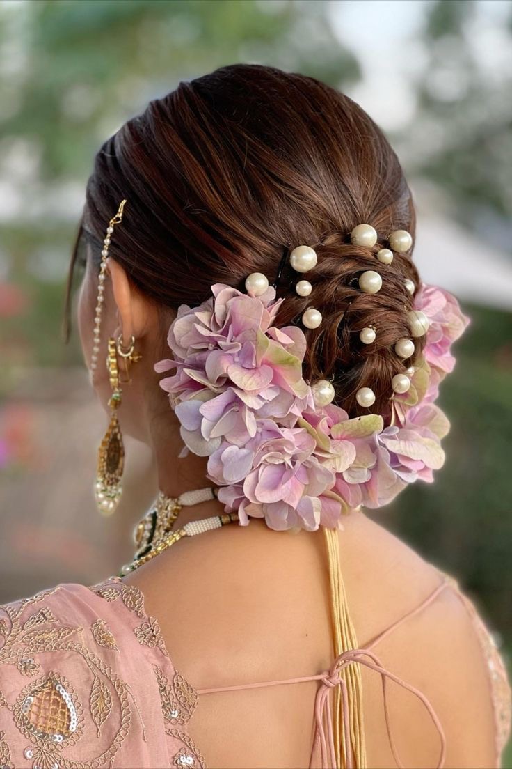 5 colourful floral bun hairstyles for brides-to-be