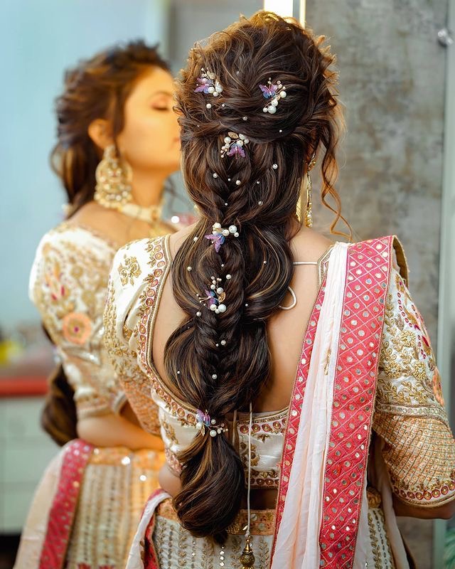 Elegant Pink Lehenga | Bridal bun, Indian bridal hairstyles, Bridal braids