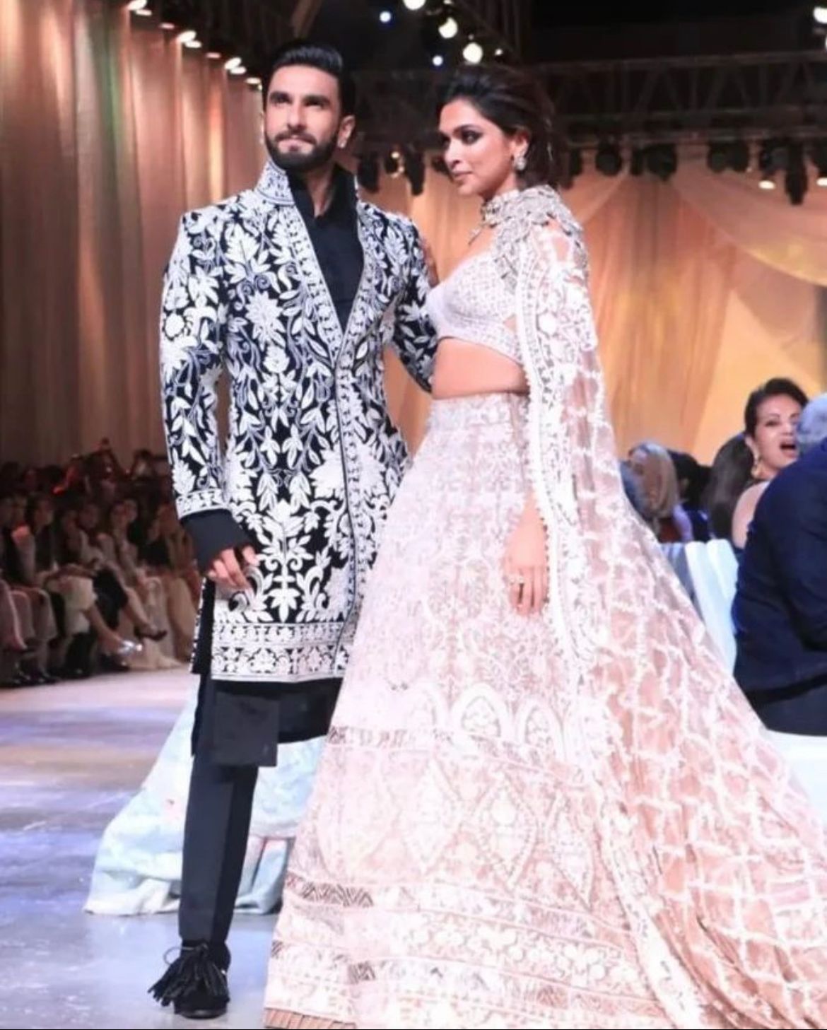 Check out this gorgeous and super cute couple as they walk down the ramp  wearing their ethnic bes… | Celebrity wedding dresses, Gorgeous dresses,  Indian celebrities