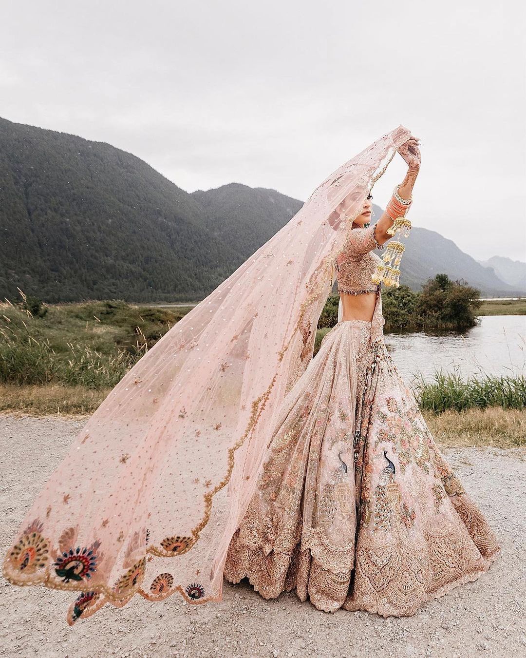 Mirari by Rimple & Harpreet | In Stores Now On Roshni, a vivid Rani pink  lehenga. The skirt features a melange of motifs- Mughal-esque p... |  Instagram