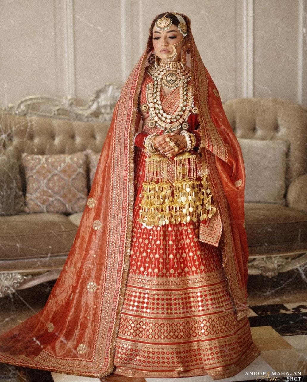 red and gold bridal lehenga - ShaadiWish