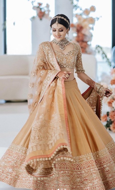 Intimate Wedding With Only 10 Guests & A Beautiful Salmon Manish Malhotra  Lehenga! | Bridal looks, Lehenga dupatta draping style, Indian bridal  outfits
