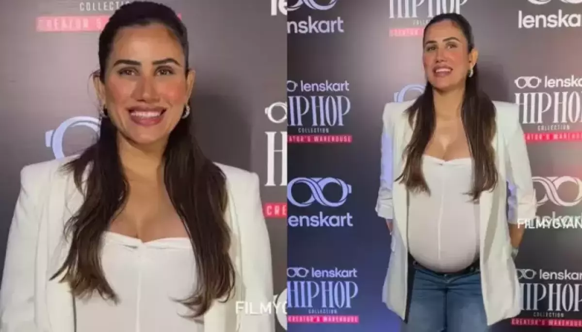 Sonnalli Seygall Radiates Pregnancy Glow In White Top And Jeans As She Attends A Brand Event In City